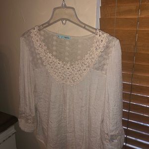 Very feminine blouse in tan/ivory.  Lace detail.